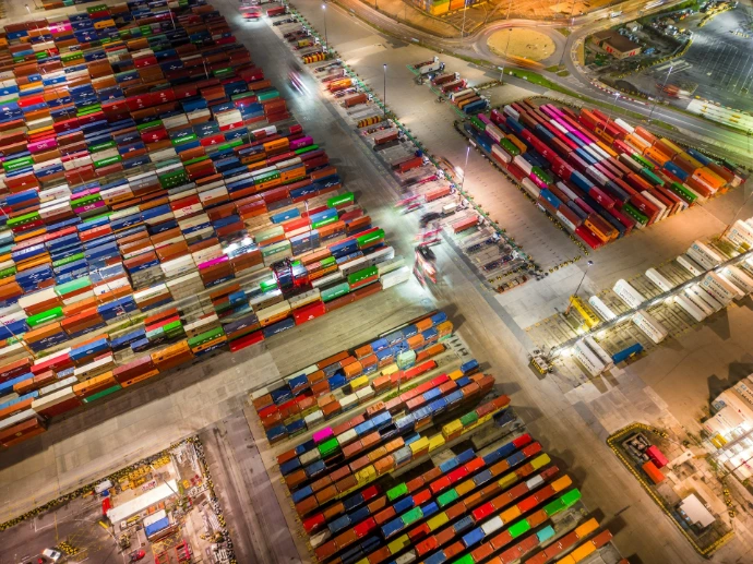 An aerial view of a large amount of shipping containers